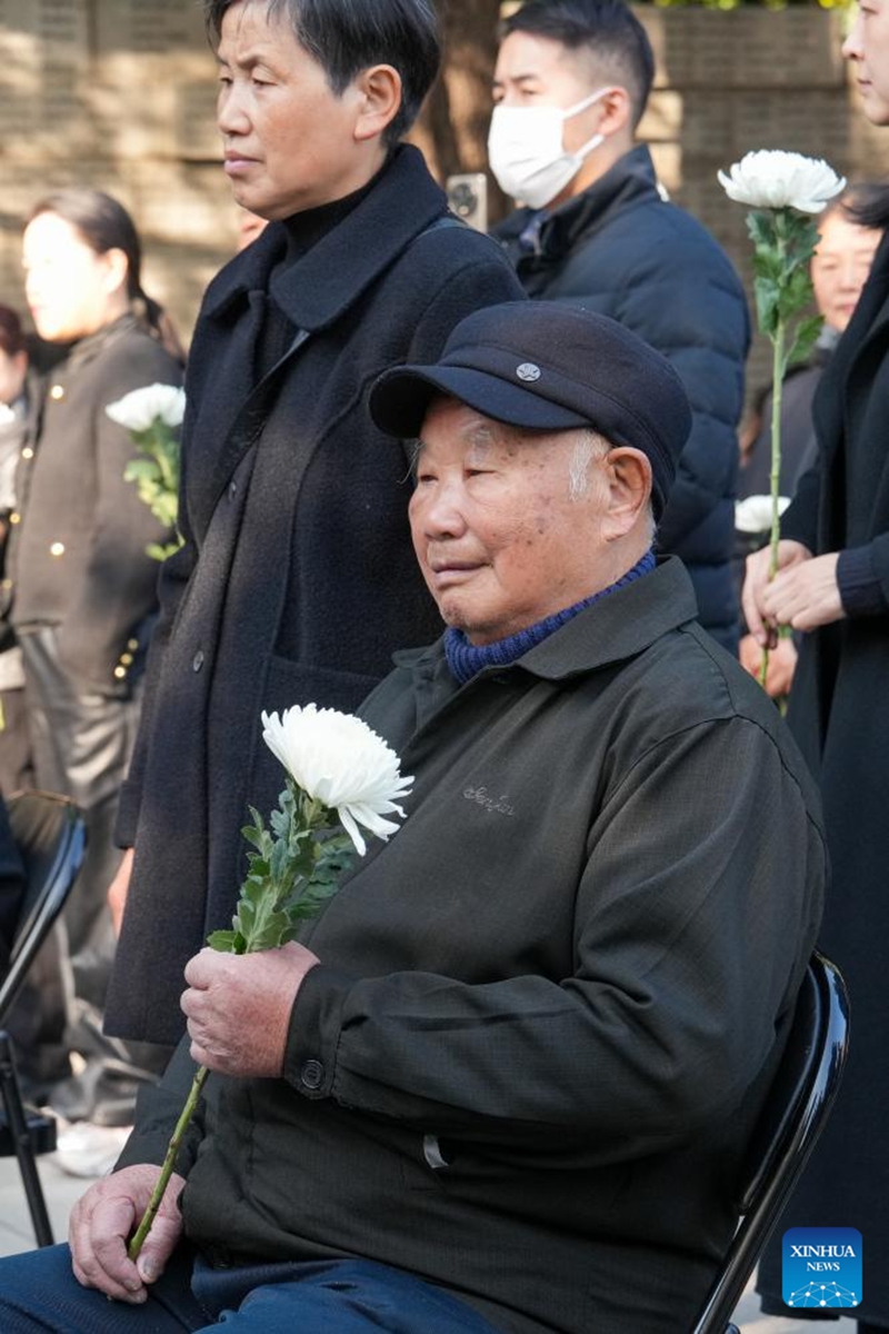 Nanjing Massacre survivor Liu Minsheng (front) attends the family commemoration for victims of the Nanjing Massacre in Nanjing, east China's Jiangsu Province, Dec. 1, 2024. Photo: Xinhua