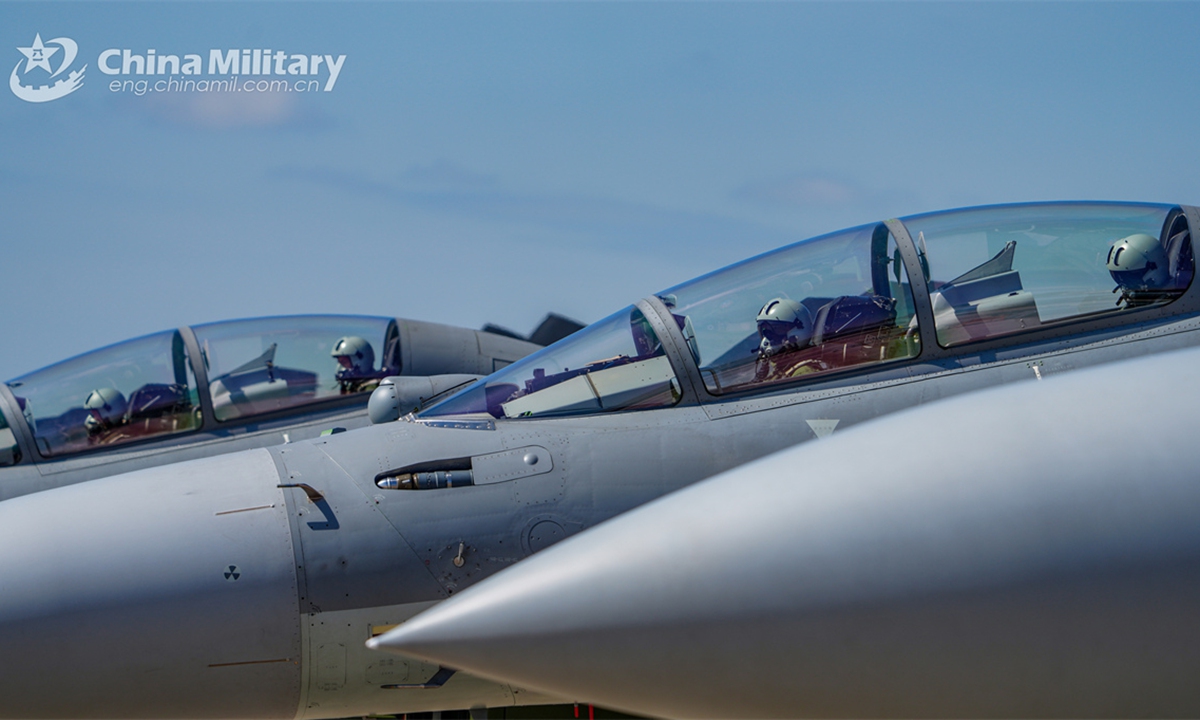 Pilots assigned to an aviation brigade with the air force under the Chinese PLA Southern Theater Command sit in the cockpits of J-16 multi-role fighter jets to get ready for a flight training exercise on October 23, 2024. (eng.chinamil.com.cn/Photo by Zhao Yutong)