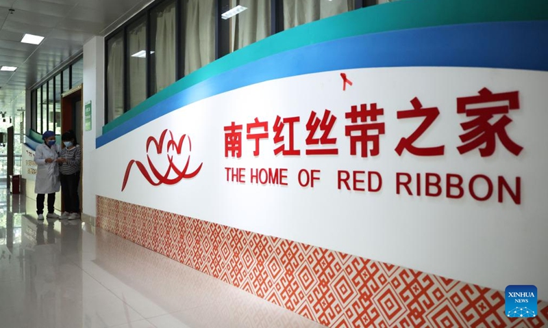 A doctor instructs the patient on medication at the Home of Red Ribbon of the Fourth People's Hospital of Nanning, in Nanning, south China's Guangxi Zhuang Autonomous Region, Nov. 22, 2024. (Photo: Xinhua)