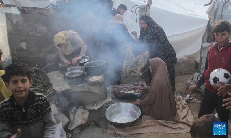 Displaced Palestinians are seen at a temporary shelter in Gaza City, on Dec. 1, 2024. (Photo: Xinhua)