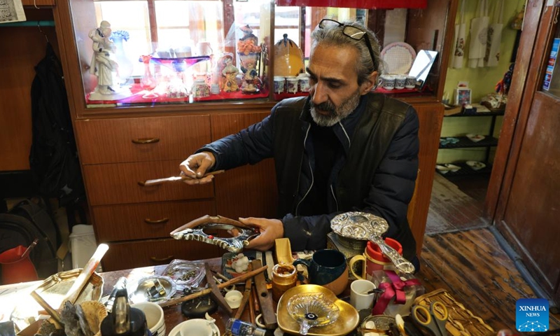 A senior works at a store in Ankara, Türkiye, on Dec. 2, 2024. Türkiye's high cost of living is pushing an increasing number of seniors back into the workforce to make ends meet, according to a leading pensioners' association. (Photo: Xinhua)