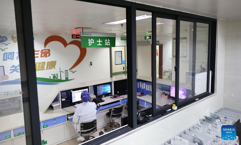 A nurse works at a ward of the Department of Infectious Diseases at the Fourth People's Hospital of Nanning, in Nanning, south China's Guangxi Zhuang Autonomous Region, Dec. 1, 2024. (Photo: Xinhua)