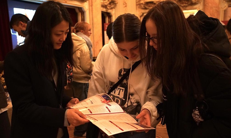 Visitors read introductions at the Study in China education exhibition in Prague, the Czech Republic, on Dec. 2, 2024.  (Photo: Xinhua)