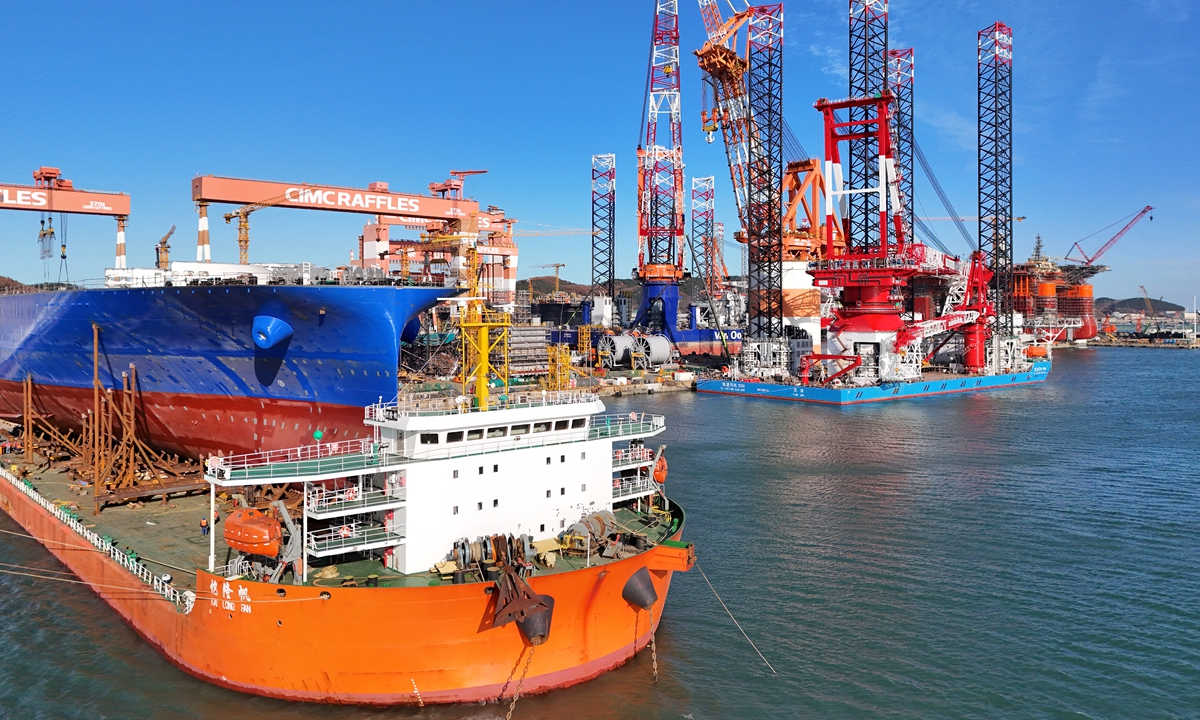 Various offshore engineering equipment and specialized vessels are under construction or maintenance at a base in Yantai, East China's Shandong, on December 4, 2024. From January to October, shipbuilding completions grew by 41 percent, new orders by 61 percent and the order backlog by 48 percent. Shandong is establishing itself as a key shipbuilding hub and global leader in offshore engineering equipment. 
Photo: VCG