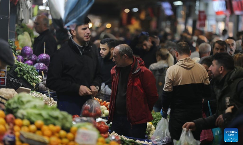 People shop at a local market in Ankara, Türkiye, Dec. 3, 2024 (Photo: Xinhua)