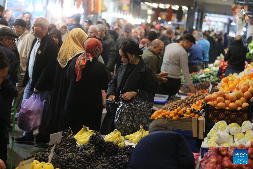 People shop at a local market in Ankara, Türkiye, Dec. 3, 2024. (Photo: Xinhua)