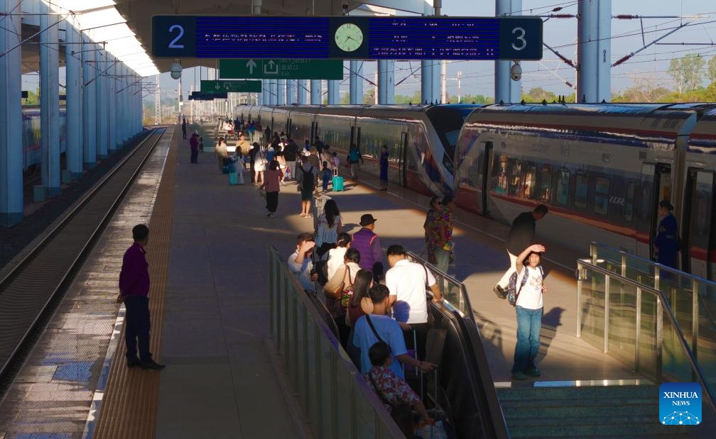 This photo taken on Dec. 3, 2024 shows passengers at the Vientiane Station of the China-Laos Railway in Vientiane, Laos. The China-Laos Railway has emerged as a catalyst for regional economic growth three years after its launch, China's railway operator said on Tuesday. Offering a safe and sustainable operation, the railway had handled over 43 million passenger trips and transported 48.3 million tonnes of cargo as of Monday, according to the China State Railway Group Co., Ltd. (Photo: Xinhua)