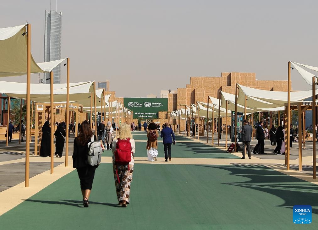 People attend the 16th Conference of the Parties (COP16) to the United Nations Convention to Combat Desertification (UNCCD) in Riyadh, Saudi Arabia, on Dec. 3, 2024. COP16, held from Dec. 2 to 13 under the theme Our Land. Our Future, is the largest UN land-focused conference to date and the first UNCCD COP in the Middle East and North Africa. Delegates are expected to make decisions on collective actions aimed at accelerating land restoration, improving resilience to droughts and sandstorms, restoring soil health, and scaling up nature-positive food production, with a focus on 2030 and beyond. (Photo: Xinhua)