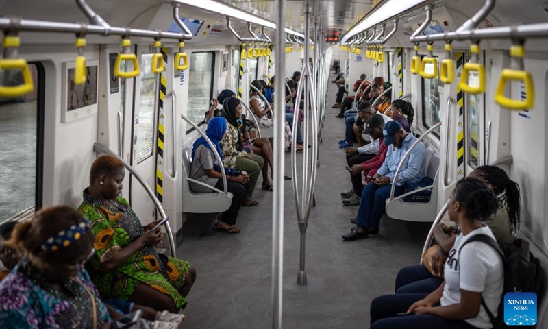 Passengers are pictured inside a train of the Lagos Rail Mass Transit (LRMT) Blue Line in Lagos, Nigeria, on Dec. 1, 2024. Started in July 2010 and accomplished in December 2022, the first phase of the LRMT Blue Line corridor project contracted by China Civil Engineering Construction Corporation (CCECC) is the first electrified railroad and cross-sea light rail project in West Africa. Spaning 13 km and covering five stations, this line kicked off its commercial operation in September 2023, and has been reckoned a symbolic project of the Belt and Road Initiative. (Photo: Xinhua)