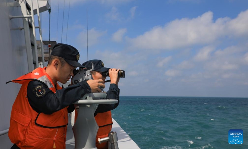 Chinese sailors observe maritime objects during a two-day joint patrol with Vietnamese navy in the Beibu Gulf, Dec. 3, 2024. Two fleets from the Chinese and Vietnamese navies on Wednesday concluded a two-day joint patrol in the Beibu Gulf. Photo: Xinhua