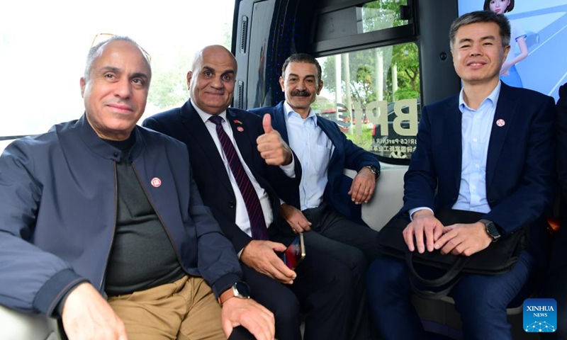 Ambassadors and diplomats from Arab States to China take a self-driving bus at Xiamen King Long United Automotive Industry Co., Ltd. in Xiamen, southeast China's Fujian Province, Nov. 30, 2024. 19 ambassadors and diplomats from Arab States to China paid a visit to Fujian recently. Located at the eastern end of the maritime Silk Road, Fujian has given play to its unique strengths in the joint implementation of the Belt and Road Initiative (BRI) and achieved fruitful results in building the core region of the 21st Century Maritime Silk Road. Photo: Xinhua