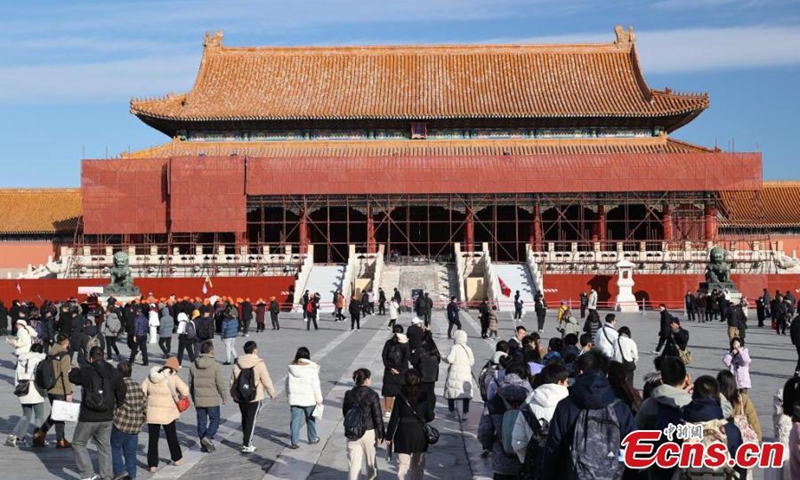 Construction workers restore Taihe Gate (The Gate of Supreme Harmony), the main gate of the palace outside the Palace Museum, in Beijing, Dec. 4, 2024. Photo: China News Service 