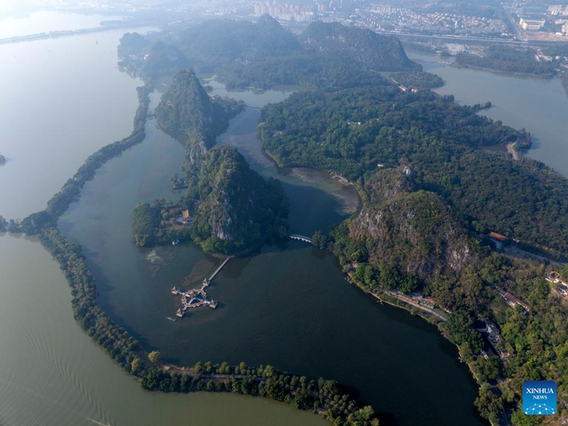 An aerial drone photo taken on Dec. 2, 2024 shows a view of the Qixingyan scenic spot of the Xinghu Scenic Area in Zhaoqing, south China's Guangdong Province. Xinghu is a national 5A-level scenic area, noted for its natural scenery, rich cliff inscriptions since the Tang Dynasty (618-907), and a variety of rare plants and animals. Photo: Xinhua