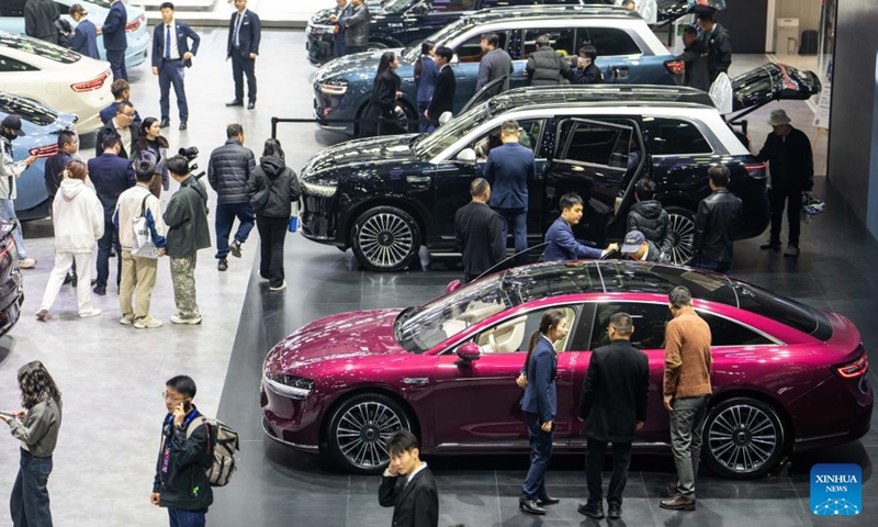 People visit the 20th China (Changsha) International Automobile Exposition in Changsha, central China's Hunan Province, Dec. 4, 2024. The 6-day exposition, with an exhibition area of 120,000 square meters, kicked off on Wednesday at the Changsha International Convention and Exhibition Center, showcasing more than 1,000 vehicles from over 80 automobile brands. Photo: Xinhua