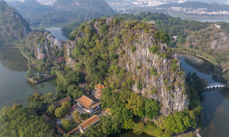 An aerial drone photo taken on Dec. 2, 2024 shows a view of the Qixingyan scenic spot of the Xinghu Scenic Area in Zhaoqing, south China's Guangdong Province. Xinghu is a national 5A-level scenic area, noted for its natural scenery, rich cliff inscriptions since the Tang Dynasty (618-907), and a variety of rare plants and animals. Photo: Xinhua