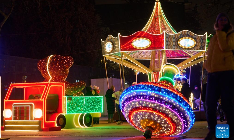 A carousel adorned with colorful lights is seen in Warsaw, Poland, on Dec. 5, 2024. Photo: Xinhua