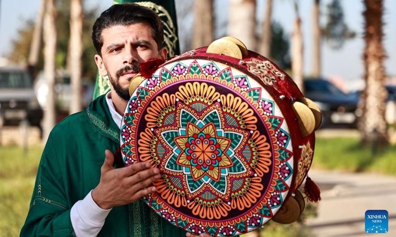 A Moroccan artist performs with a traditional folk music instrument at the 6th Meknes International Tourism Forum in Meknes, Morocco, Dec. 3, 2024. (Photo: Xinhua)