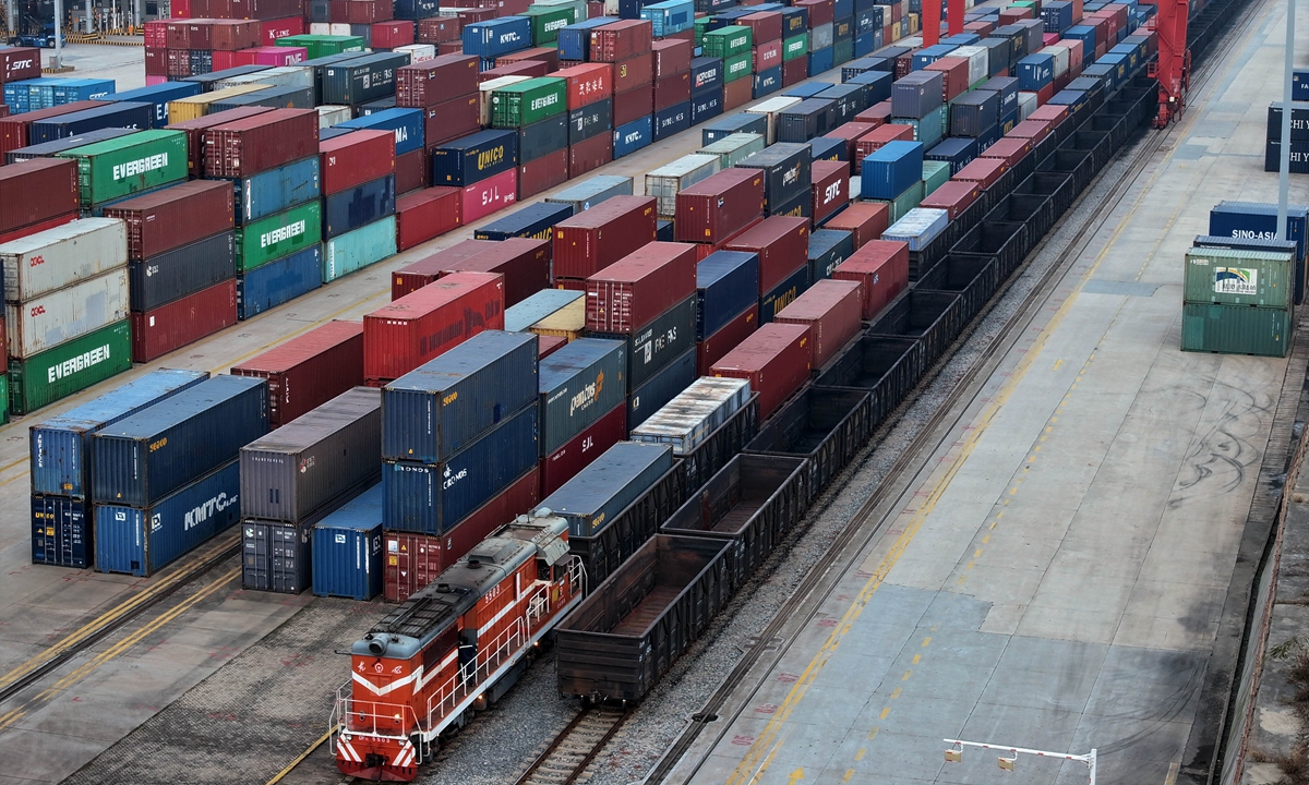 A China-Europe freight train loaded with containers is about to depart from the China-Kazakhstan (Lianyungang) Logistics Cooperation Base on December 6, 2024, in Lianyungang, East China's Jiangsu Province. Currently, the base has over 20 specialized freight trains for goods such as automotive parts and home appliances. It has become an important hub for cross-border transportation between Asia and Europe. Photo: VCG