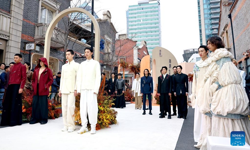 Models present creations during a fashion show held at Zhangyuan, or Zhang's Garden, in east China's Shanghai, Dec. 7, 2024. With the century-old Shikumen complex as the background and the Maoming North Road as the runway, a fashion show was held here on Saturday, bringing together the creations of many outstanding young designers in China. Photo: Xinhua