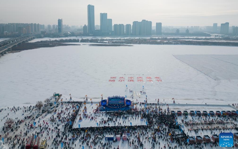 An aerial drone photo shows a view of an ice collecting festival in Harbin, northeast China's Heilongjiang Province, Dec. 7, 2024. Marking the beginning of Harbin's ice collecting season, the fifth ice collecting festival kicked off here by the Songhua River on Saturday, attracting lots of people with ice collecting ceremony and performances. Photo: Xinhua