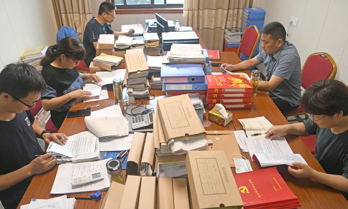 Discipline inspection personnel from Shouxian county in East China's Anhui Province review accounts in Anfengtang township, on July 6, 2022. Photo: VCG