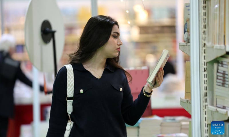 A woman visits the Iraq International Book Fair in Baghdad, Iraq, on Dec. 7, 2024. Photo: Xinhua