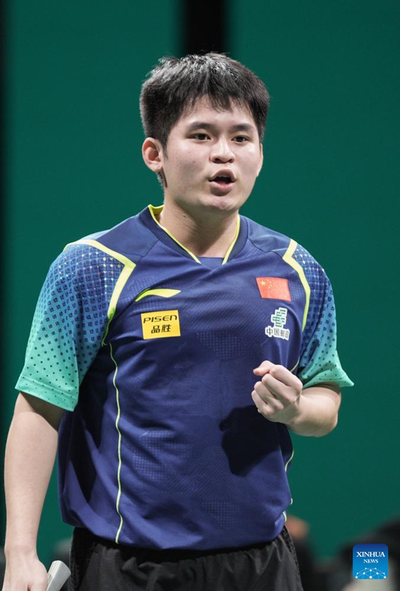 Lin Shidong of China celebrates in the game against Eduard Ionescu of Romania during the semifinal match between China and Romania at the ITTF Mixed Team World Cup 2024 in Chengdu, southwest China's Sichuan Province, Dec. 8, 2024. Photo: Xinhua