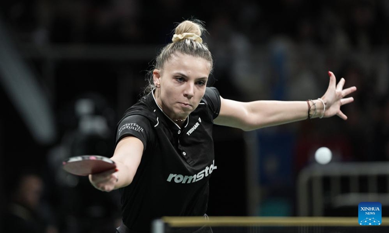 Adina Diaconu of Romania hits a return against Wang Manyu of China during the semifinal match between China and Romania at the ITTF Mixed Team World Cup 2024 in Chengdu, southwest China's Sichuan Province, Dec. 8, 2024. Photo: Xinhua