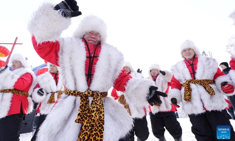 Ice collecting crew perform during an ice collecting festival in Harbin, northeast China's Heilongjiang Province, Dec. 7, 2024. Marking the beginning of Harbin's ice collecting season, the fifth ice collecting festival kicked off here by the Songhua River on Saturday, attracting lots of people with ice collecting ceremony and performances. Photo: Xinhua