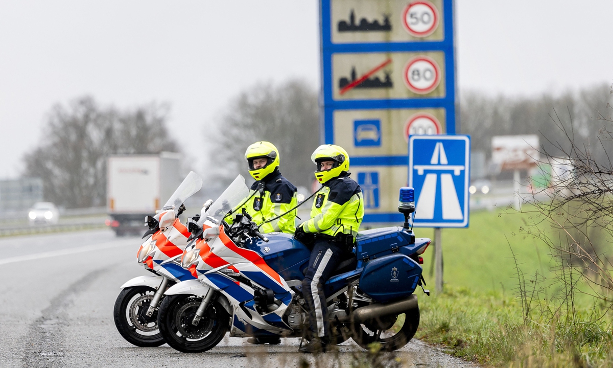 Marechaussee motorcyclists operate on the roadside during the launch of border controls nearby Eijsden, Netherlands, on December 9, 2024. The Netherlands is temporarily introducing a six-month border control at its internal borders to combat irregular migration and cross-border crime. Photo: VCG