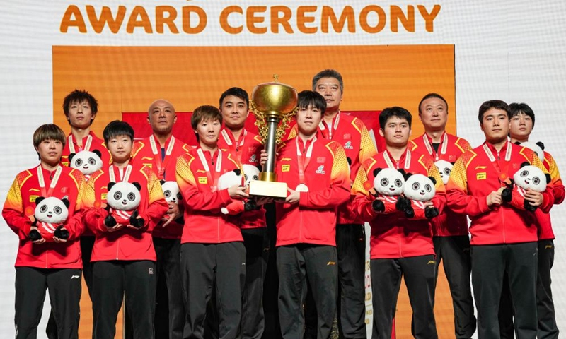 Team China pose on the podium during the awarding ceremony after the final match between China and South Korea at the ITTF Mixed Team World Cup 2024 in Chengdu, southwest China's Sichuan Province, Dec. 8, 2024.  Photo: Xinhua