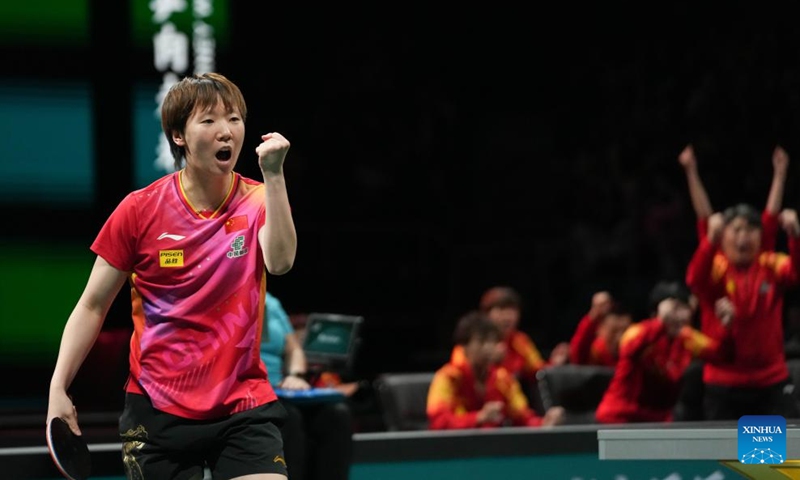 Wang Manyu of China celebrates during the women's singles match against Kim Nayeong of South Korea at the final match between China and South Korea at the ITTF Mixed Team World Cup 2024 in Chengdu, southwest China's Sichuan Province, Dec. 8, 2024. Photo: Xinhua