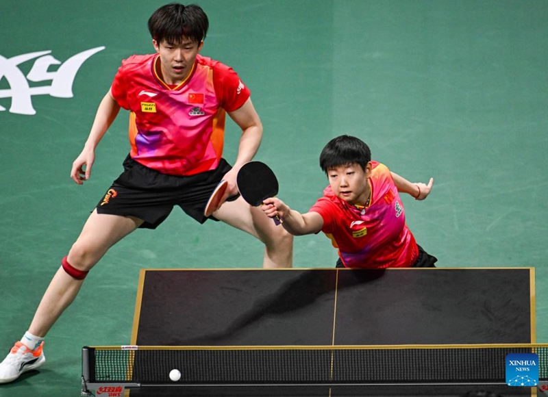 Wang Chuqin/Sun Yingsha (R) of China compete during the mixed doubles match against Cho Daeseong/Shin Yubin of South Korea at the final match between China and South Korea at the ITTF Mixed Team World Cup 2024 in Chengdu, southwest China's Sichuan Province, Dec. 8, 2024. Photo: Xinhua