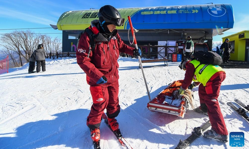 Yao He (L) and his colleague arrange the rescue equipment at Lake Songhua Resort in Jilin City, northeast China's Jilin Province, Dec. 7, 2024.  Photo: Xinhua