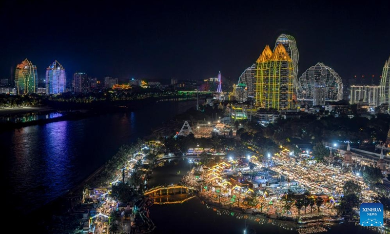 This photo shows a view of the Starlight Night Market in Jinghong City of Xishuangbanna Dai Autonomous Prefecture, southwest China's Yunnan Province, Dec. 7, 2024. The night market is a destination to experience the customs of Dai ethnic group. Photo: Xinhua