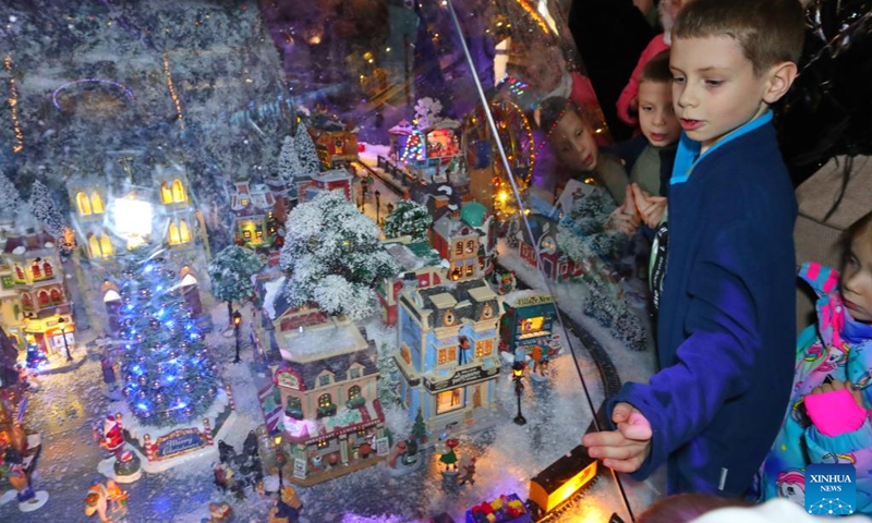 People shop for New Year gifts at a shopping mall in Minsk, Belarus, Dec. 8, 2024. Photo: Xinhua