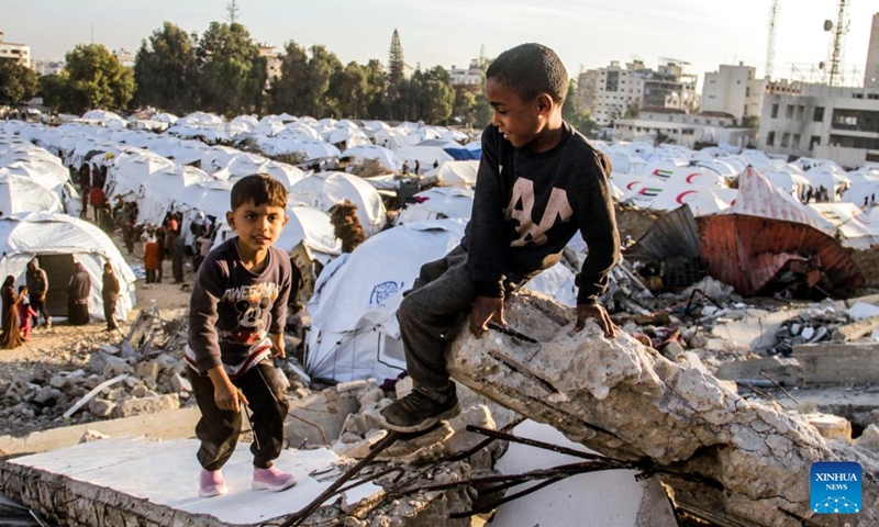 Displaced Palestinian children play in a shelter in Gaza City on Dec. 9, 2024. (Photo:Xinhua)