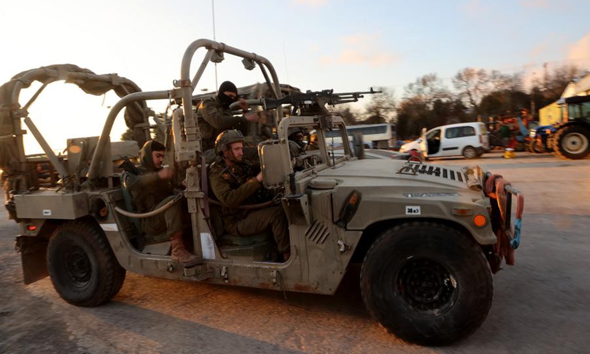 This photo taken on Dec. 8, 2024 shows Israeli troops in the Israeli-occupied Golan Heights. (Photo: Xinhua)