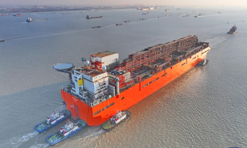 This aerial drone photo taken on Dec. 9, 2024 shows the NGUYA FLNG, a floating liquified natural gas (FLNG) facility, being tugged in the Nantong section of the Yangtze River in east China's Jiangsu Province.  (Photo: Xinhua)