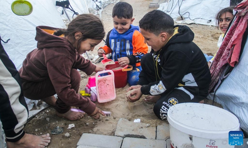 Displaced Palestinian children play in a shelter in Gaza City on Dec. 9, 2024. (Photo:Xinhua)