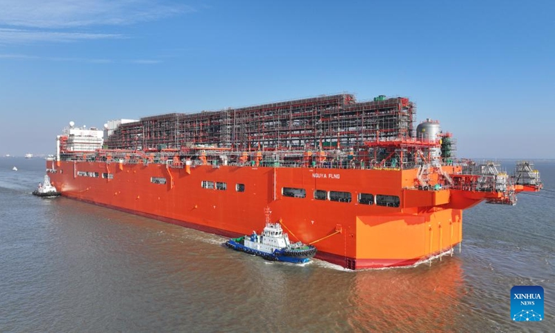 This aerial drone photo taken on Dec. 9, 2024 shows the NGUYA FLNG, a floating liquified natural gas (FLNG) facility, being tugged in the Taicang section of the Yangtze River in east China's Jiangsu Province. (Photo: Xinhua)