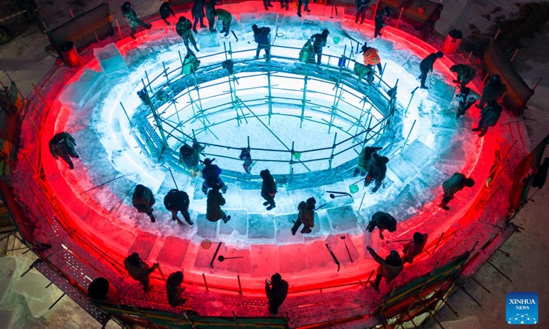 A drone photo taken on Dec. 9, 2024 shows laborers working at the construction site of the Harbin Ice-Snow World in Harbin, northeast China's Heilongjiang Province.(Photo: Xinhua)