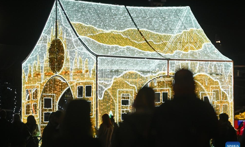 People look at a light decoration at a Christmas fairyland in Valletta, Malta, on Dec. 10, 2024. (Photo: Xinhua)