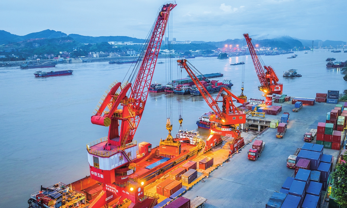 Trucks shuttle back and forth in a container terminal in Wuzhou, South China's Guangxi Zhuang Autonomous Region on June 26, 2024. China's foreign trade in the first five months of 2024 recorded a yearly increase of 6.3 percent amid the country's steady economic recovery. Photo: cnsphoto