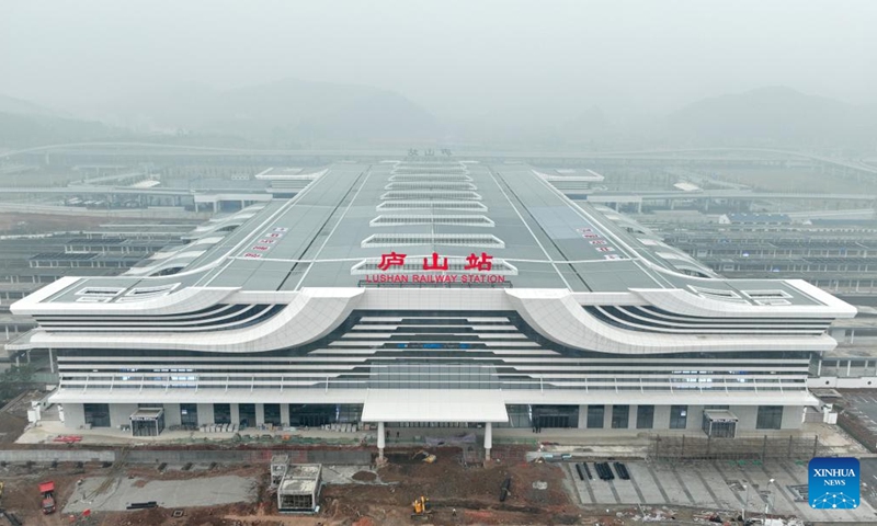 A drone photo shows the Lushan Railway Station in Jiujiang, east China's Jiangxi Province, Dec. 10, 2024. The newly-built Lushan Railway Station will facilitate travel to Lushan Mountain in Jiujiang, a UNESCO World Heritage site in east China's Jiangxi Province. (Photo: Xinhua)