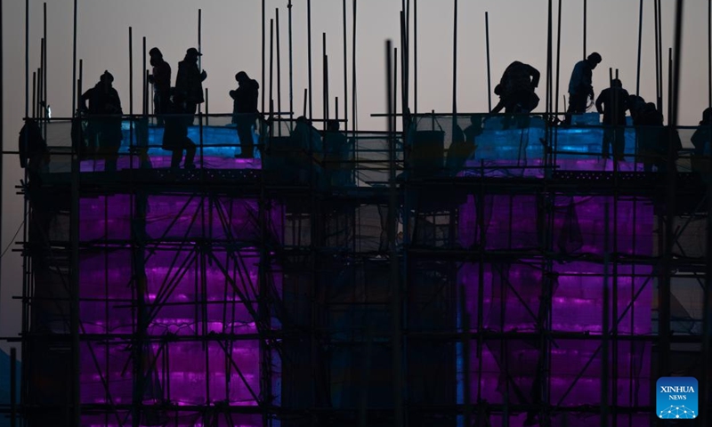 Laborers work at the construction site of the Harbin Ice-Snow World in Harbin, northeast China's Heilongjiang Province, Dec. 9, 2024. (Photo: Xinhua)