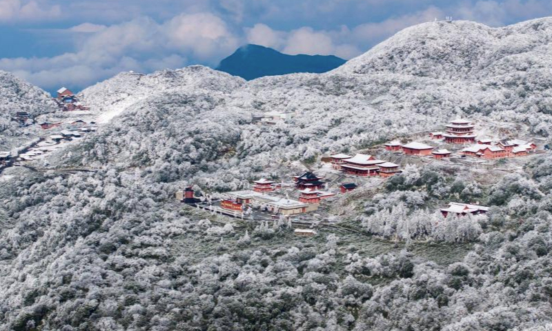 An aerial drone photo taken on Dec. 15, 2024 shows the snow-covered Jinfo Mountain in Nanchuan District, southwest China's Chongqing Municipality. (Photo by Gan Haomin/Xinhua)