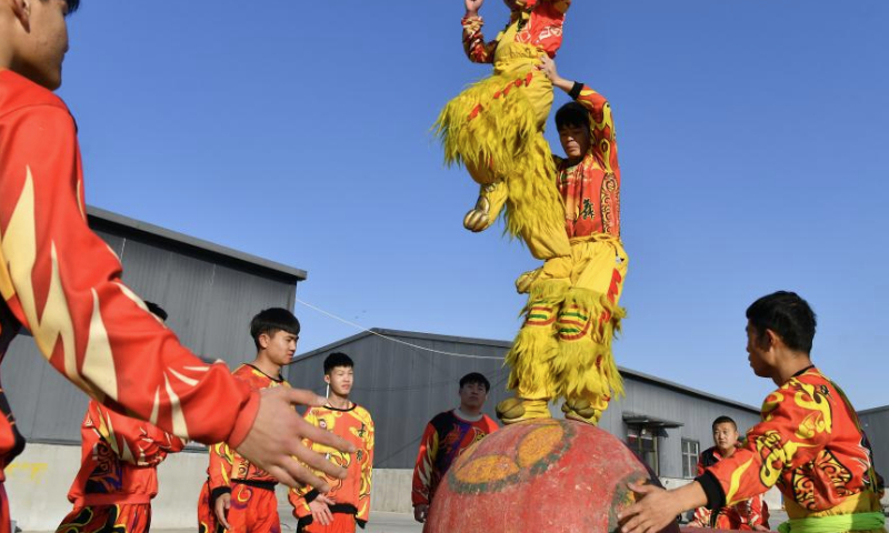 Trainees practice lion dance at a training base in Cangxian County, north China's Hebei Province, Dec. 20, 2024. Cangxian Lion Dance is a unique folk art with a long history, which was inscribed into the national intangible cultural heritage list in 2008. Thanks to the policy and funding support of local authorities in recent years, the traditional art has been well passed on. There are nine registered lion dance teams and nearly 1,000 performers in the county. (Xinhua/Mu Yu)