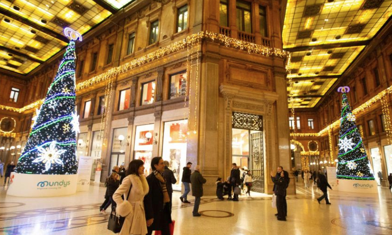 People visit Galleria Alberto Sordi decorated with festive lights in Rome, Italy, Dec. 18, 2024. (Xinhua/Li Jing)