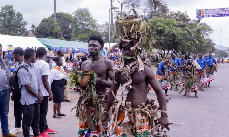 People in traditional dresses are pictured at the South West Cultural Festival in Buea, Southwest Region, Cameroon, Dec. 15, 2024. (Photo by Muleng Timngum/Xinhua)